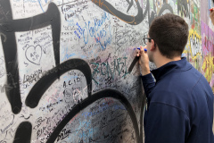 Signing the "Peace Wall"in Belfast