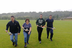 Mastering Running while Balancing Hurling Ball